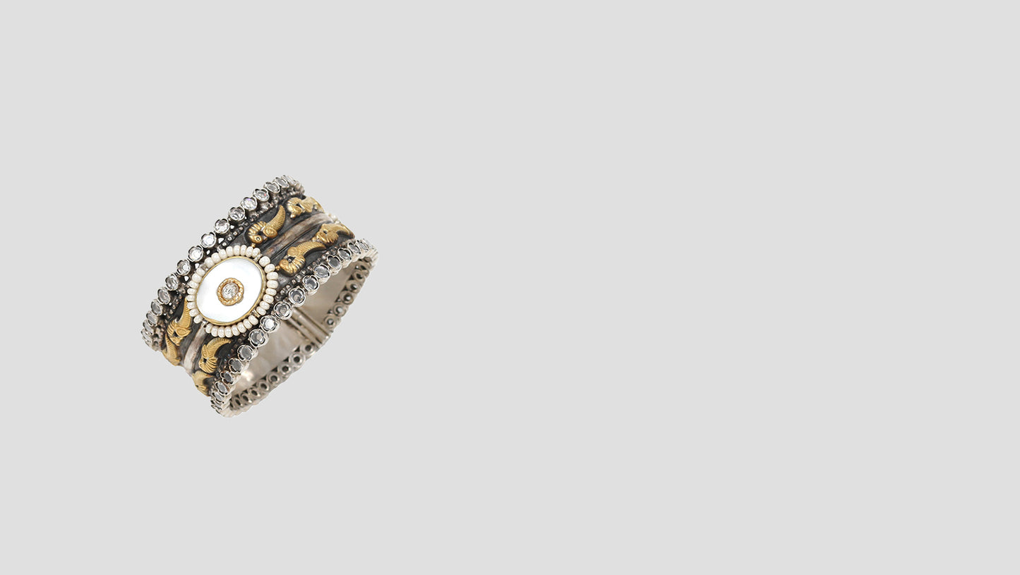 Golden Grace: Ornate Silver and Gold-Toned Bangle by Sangeeta Boochra