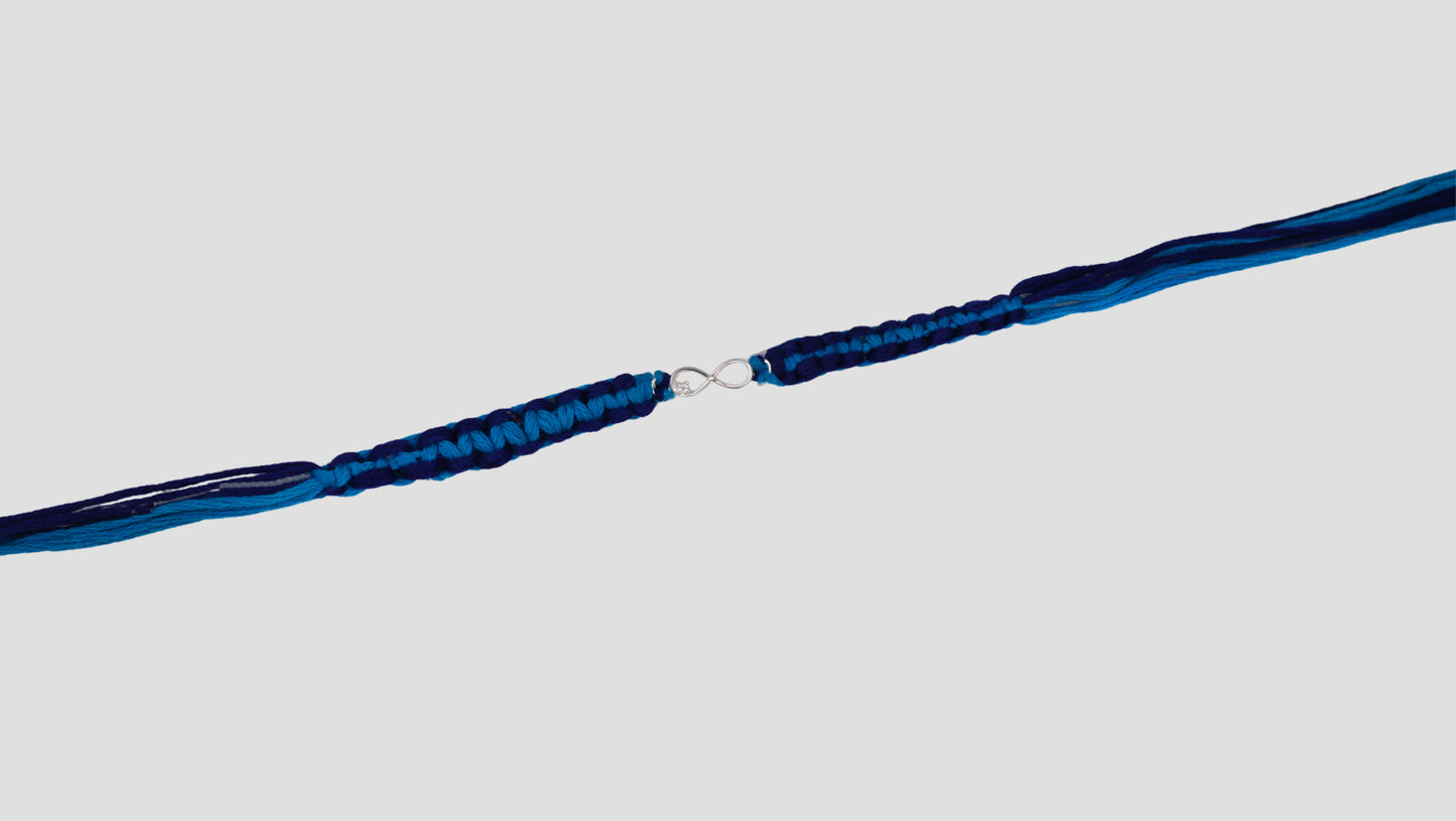 Infinity Symbol Silver Rakhi with Blue Thread | Sangeeta Boochra