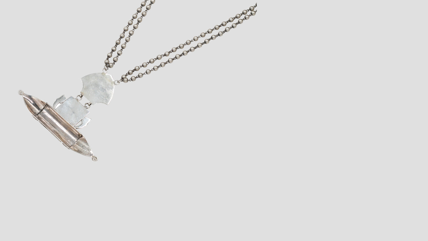 "Heritage Charm: Sangeeta Boochra Handcrafted Silver Pendant"