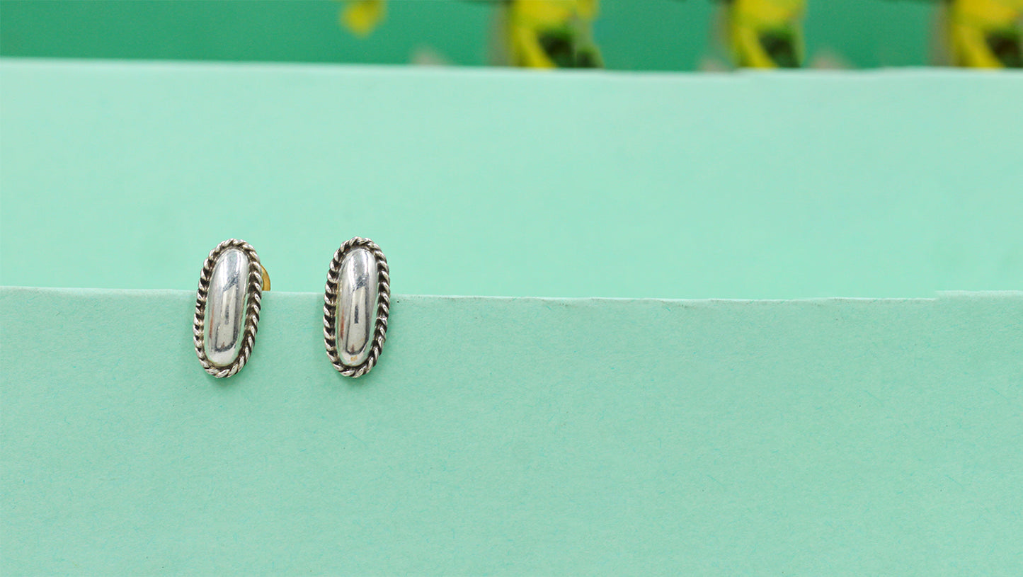 Graceful Oval Silver Earrings by Sangeeta Boochra