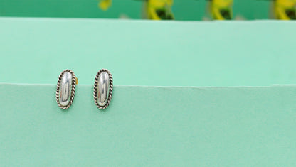 Graceful Oval Silver Earrings by Sangeeta Boochra