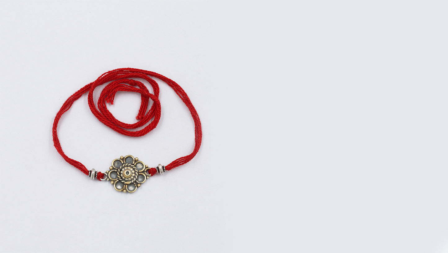 Sangeeta Boochra "925 Sterling Silver Rakhi: Timeless Bond"