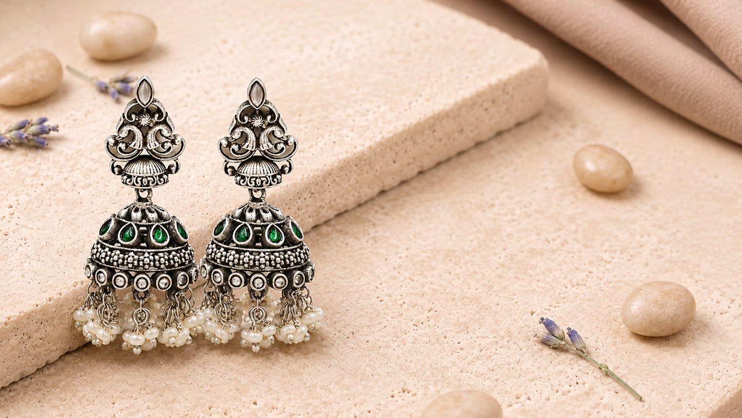 Sangeeta Boochra Peacock Motif Silver Jhumka Earrings with Green Kundan Stones & Pearl Tassels