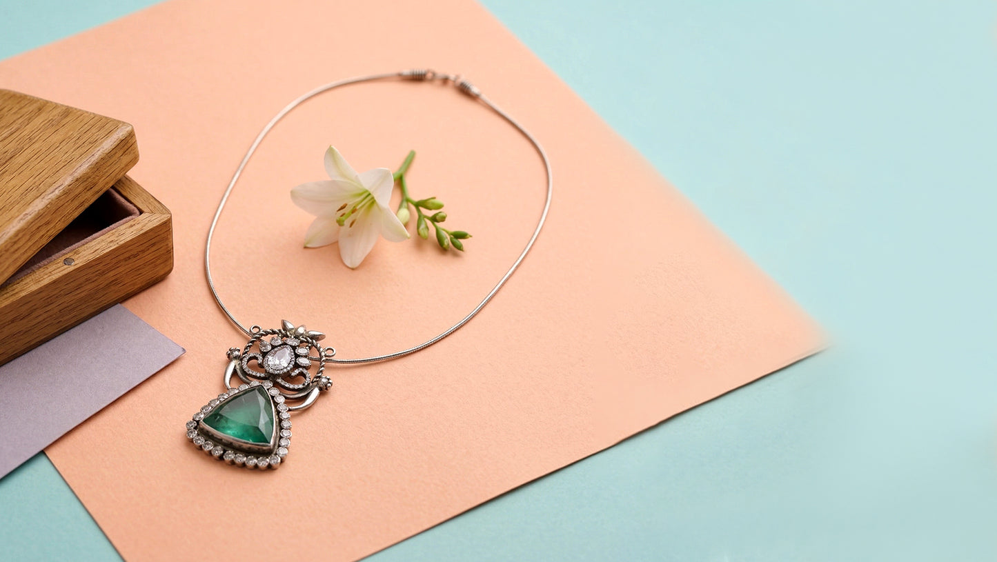 Sangeeta Boochra Elegant Moissanite Silver Pendant with Green Triangular Stone