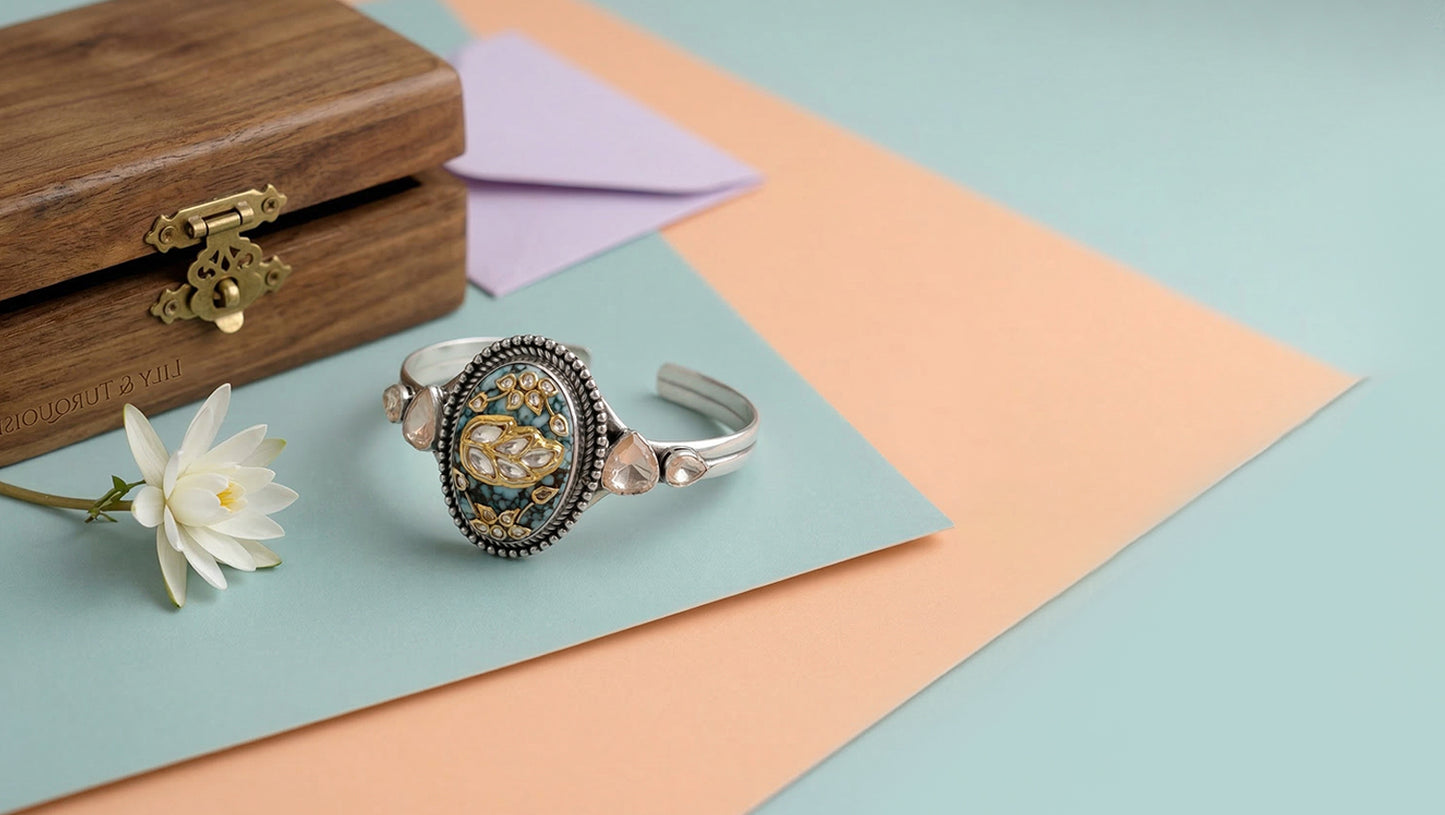 Sangeeta Boochra Handcrafted Silver Bracelet with Turquoise Centerpiece & Floral Motif