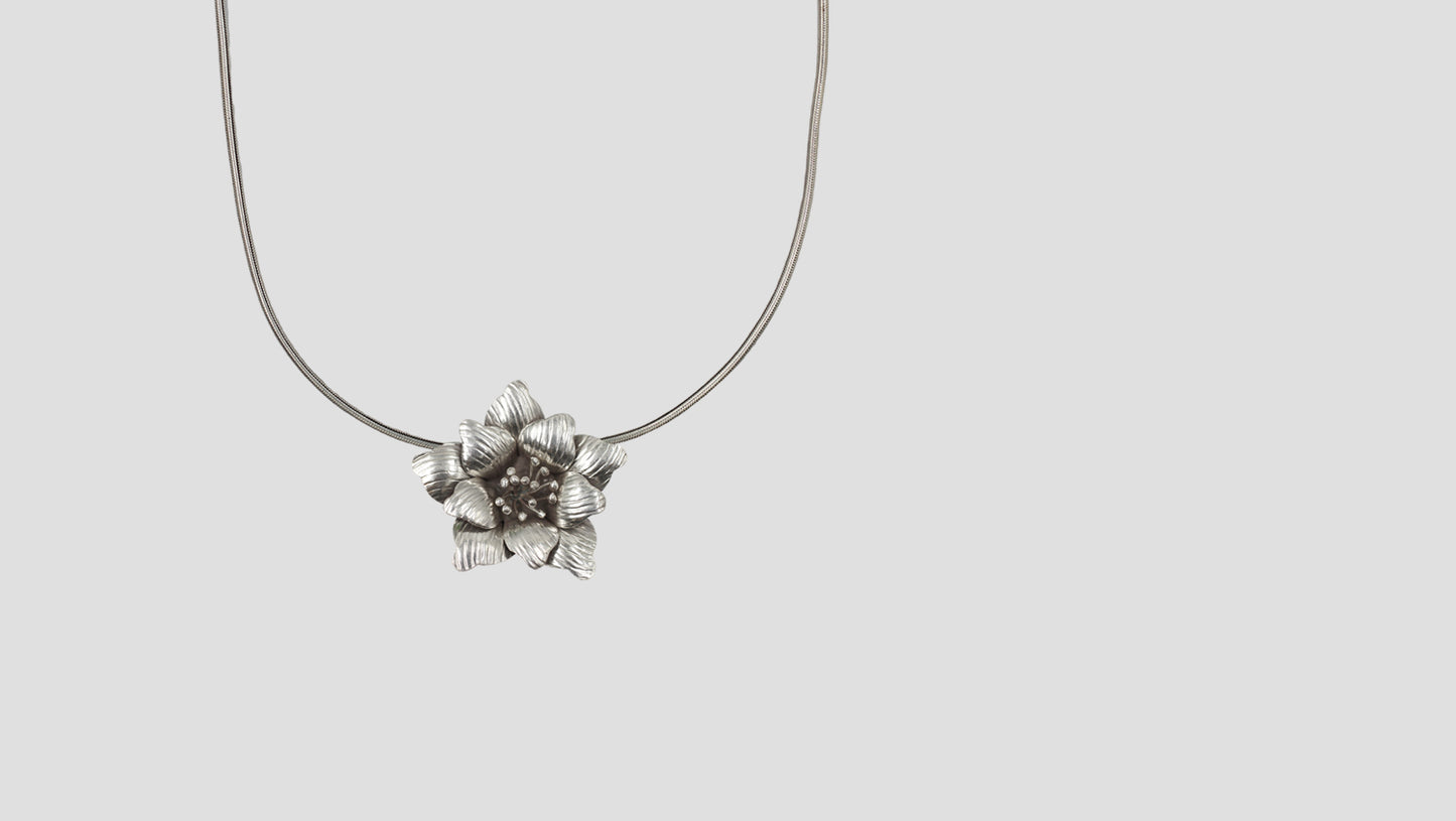 Handcrafted Oxidised Flower Design Silver Pendant by Sangeeta Boochra