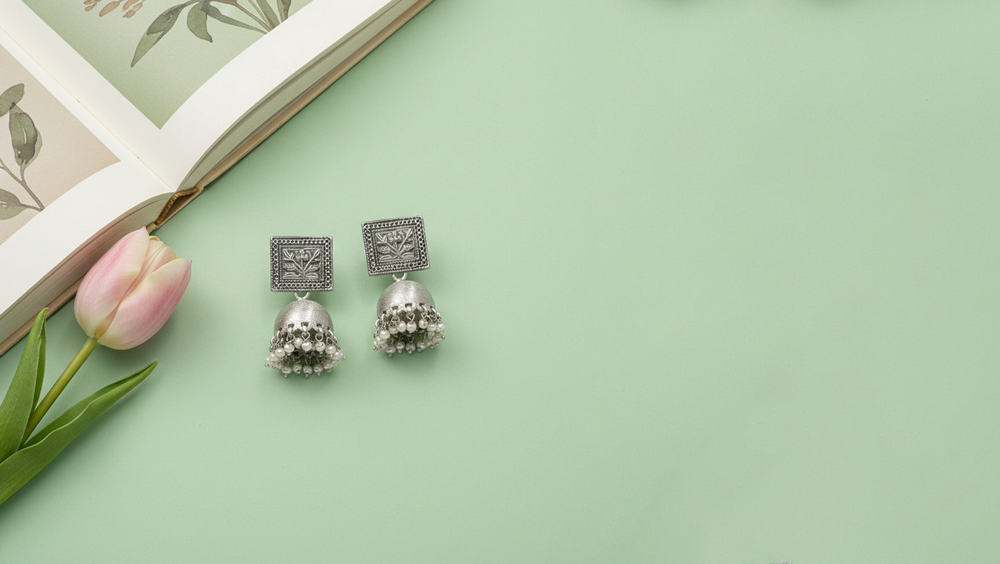 Floral Engraved Oxidised Silver Jhumki Earrings