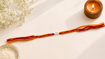 925 Sterling Silver Evil Eye Rakhi with Red & Orange Thread | Sangeeta Boochra