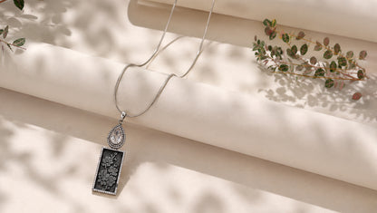 Sangeeta Boochra Designer Oxidised Silver Pendant with Floral Engraving & Moissanite