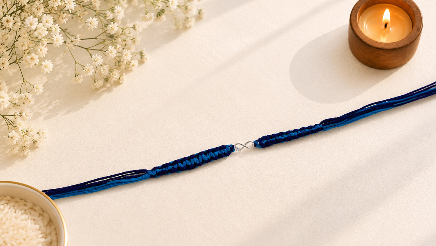 Infinity Symbol Silver Rakhi with Blue Thread | Sangeeta Boochra