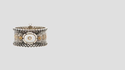 Heritage Glow: Handcrafted 925 Silver Bangle with Gold Floral Details