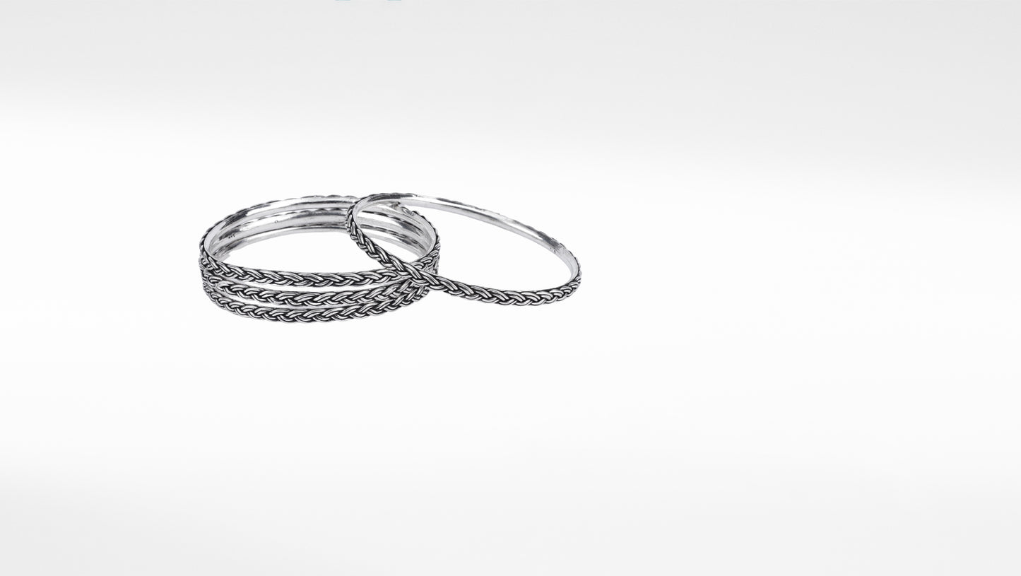 Silver twisted bangle pair