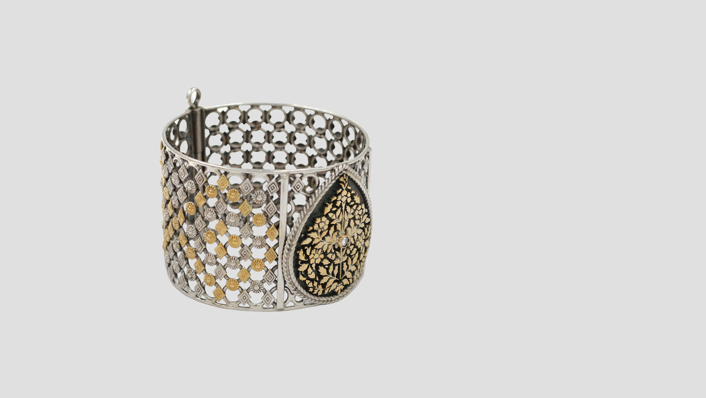 Sangeeta Boochra Statement Silver Bangle with Gold Accents & Floral Motif