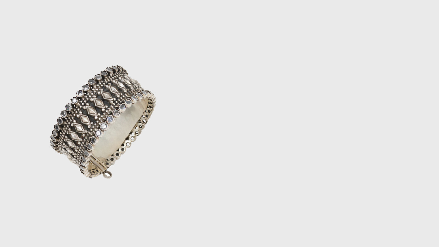 Radiant Splendor: Handcrafted Silver Bangle by Sangeeta Boochra