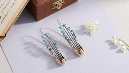 Sangeeta Boochra Handcrafted Dual Tone Peacock Motif Silver Earrings with Turquoise Stones