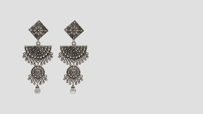 "Sculpted Beauty: Designer Silver Hanging Earrings by Sangeeta Boochra "