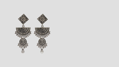 "Sculpted Beauty: Designer Silver Hanging Earrings by Sangeeta Boochra "