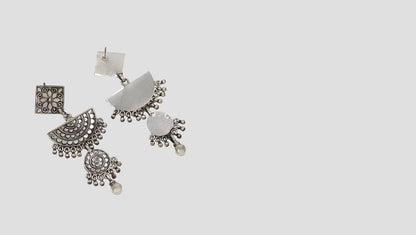 "Sculpted Beauty: Designer Silver Hanging Earrings by Sangeeta Boochra "