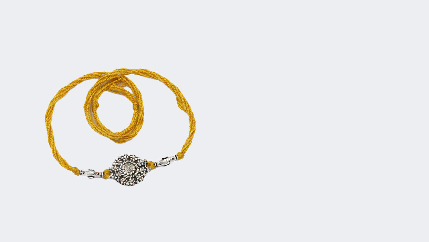 Sangeeta Boochra "925 Sterling Silver Rakhi: Timeless Bond"