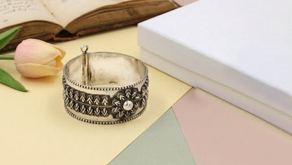 Sangeeta Boochra Floral Motif Oxidised Silver Bangle
