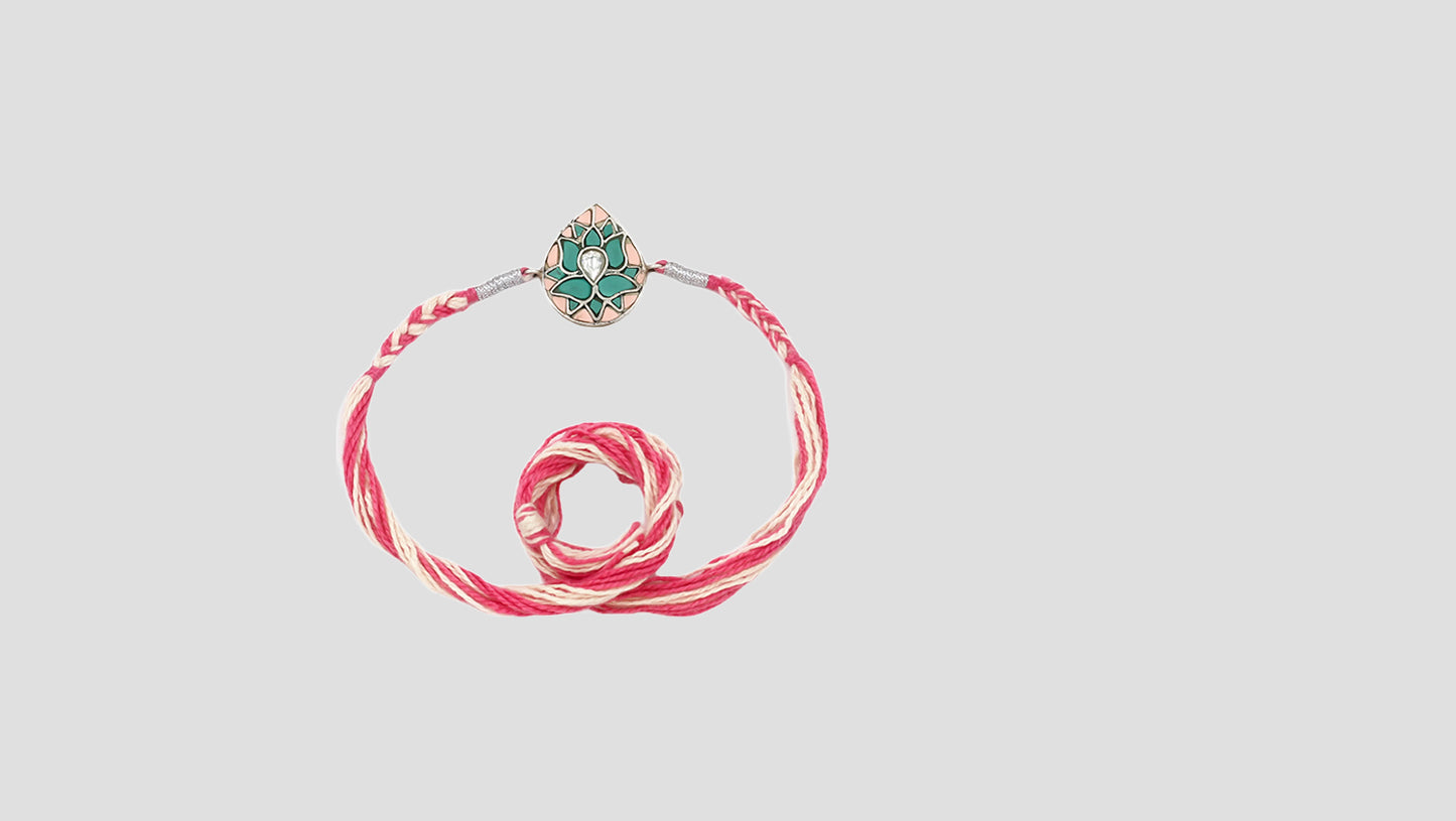 "Lotus Grace Silver Rakhi by Sangeeta Boochra"