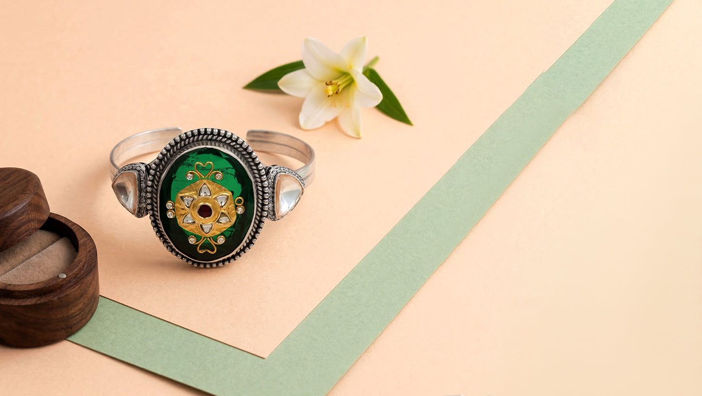 Sangeeta Boochra Handcrafted Silver Bracelet with Green Stone & Floral Motif