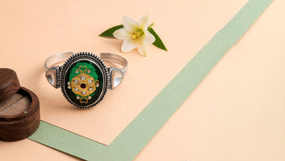 Sangeeta Boochra Handcrafted Silver Bracelet with Green Stone & Floral Motif