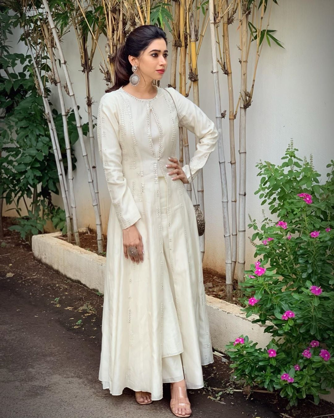 Aarti Ravi in Silver Earrings