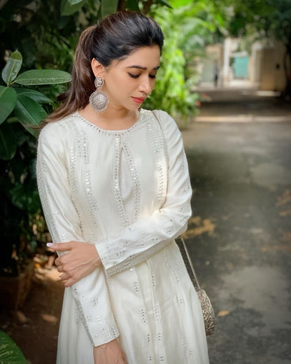 Aarti Ravi in Silver Earrings