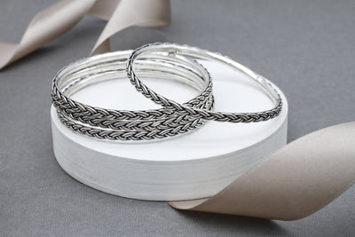 Silver twisted bangle pair