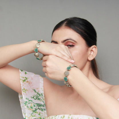 Silver Handcrafted Bracelet with Turquiose Gemstone and Floral Hand Work