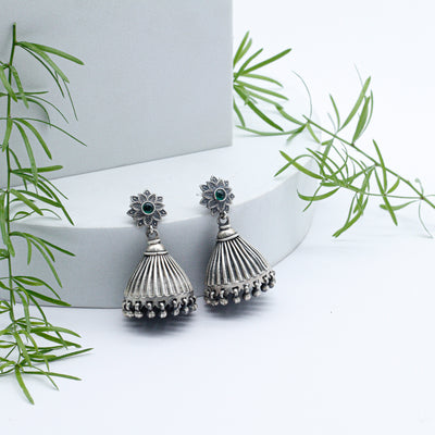 Emerald Studded Floral Design Silver Jhumki Pair
