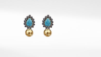 Deliberately handcrafted turquoise gemstone embellished silver earring