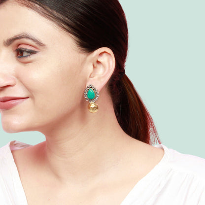 Deliberately handcrafted turquoise gemstone embellished silver earring