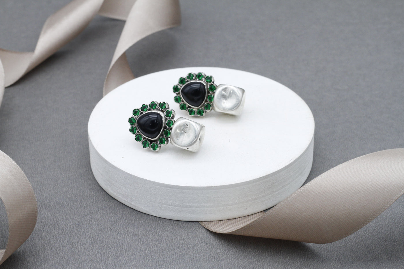 Handcrafted silver earring studded with onyx gemstone