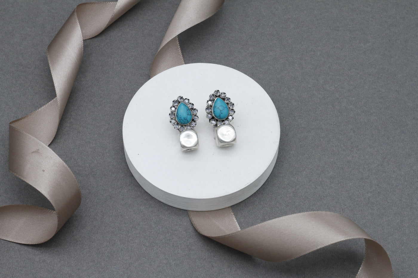 Beautiful sterling silver earring embellished with high quality turquoise gemstone