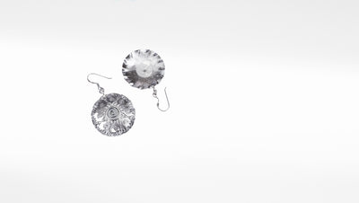 Round silver dangle earring