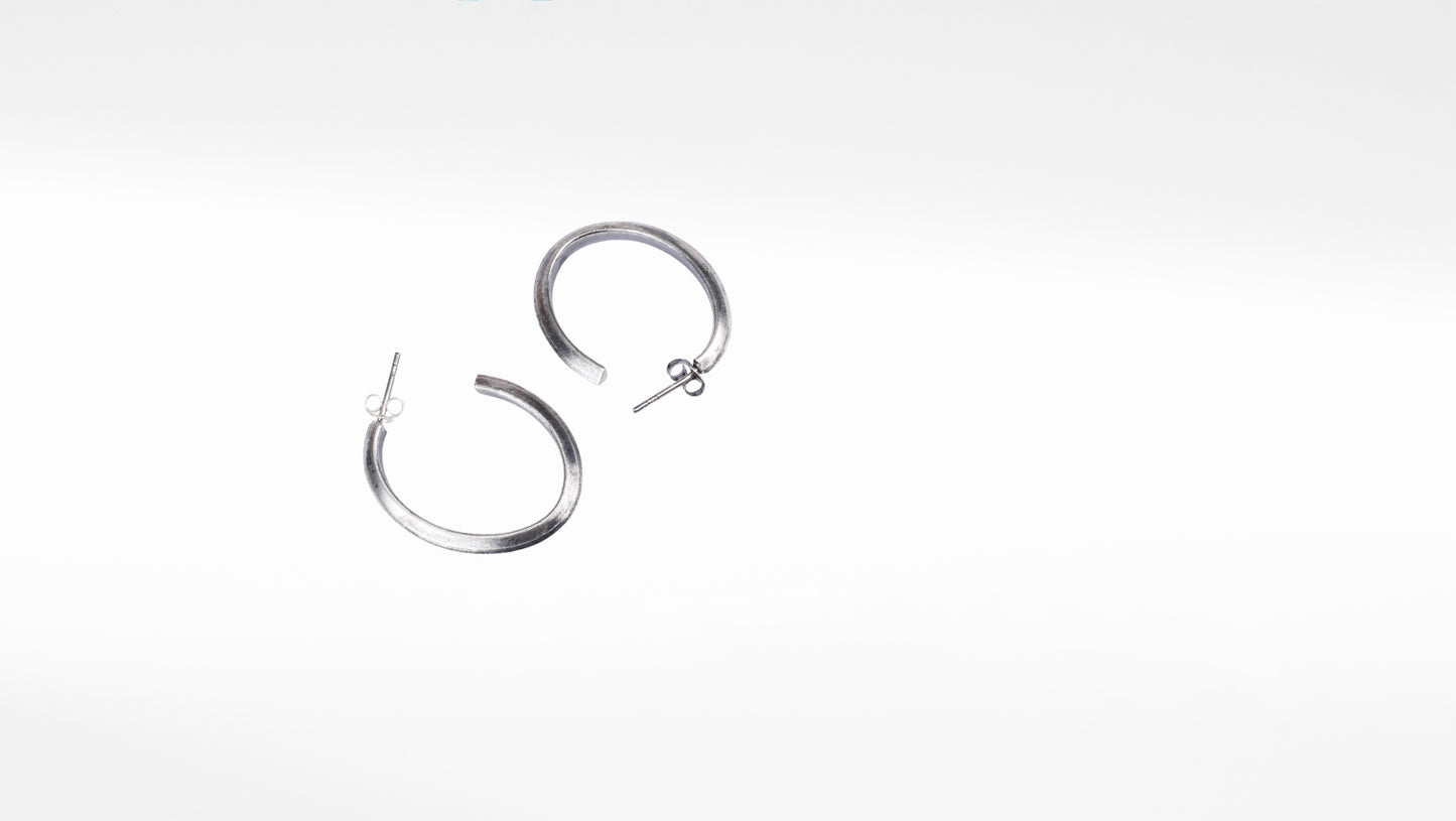 Silver hoop earring