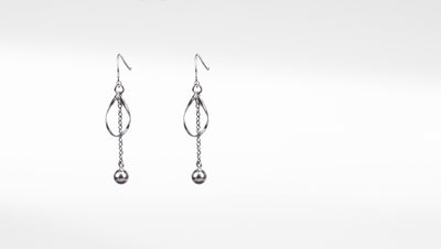 Beautiful long dangle silver earring with hanging balls