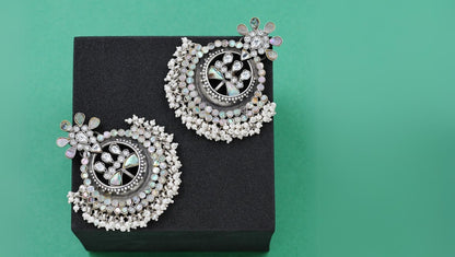 Graceful Glow: Sangeeta Boochra Silver Earrings Adorned with MOP