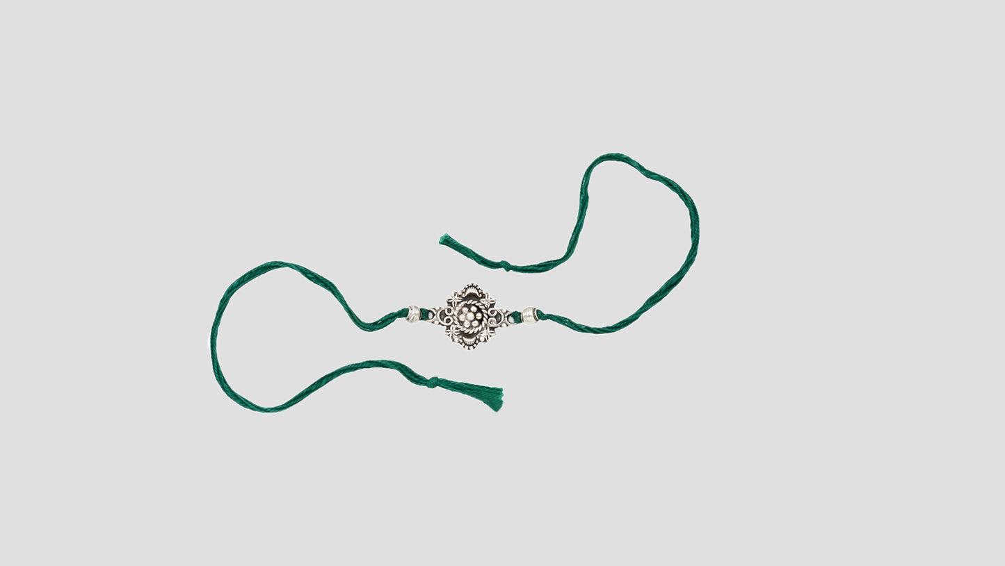 Royal Heritage Silver Rakhi by Sangeeta Boochra