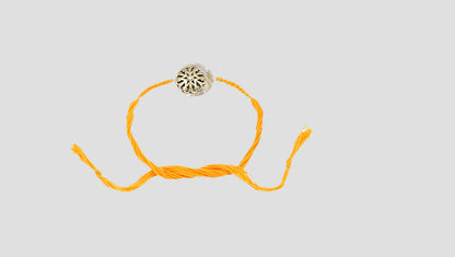 Golden Glow Silver Rakhi By Sangeeta Boochra