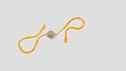 Golden Glow Silver Rakhi By Sangeeta Boochra