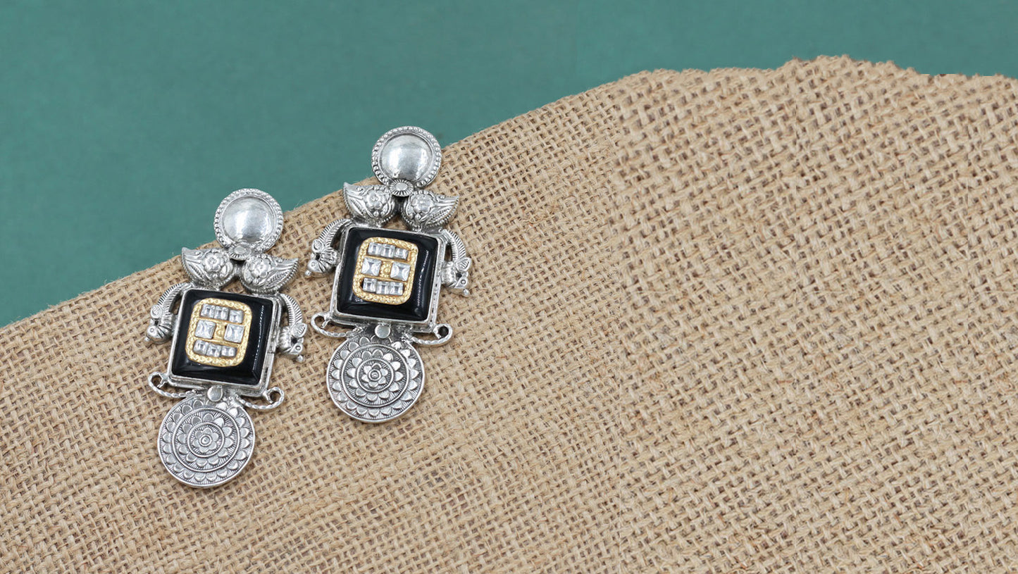 Graceful Cascades: Elegant Silver Drops by Sangeeta Boochra