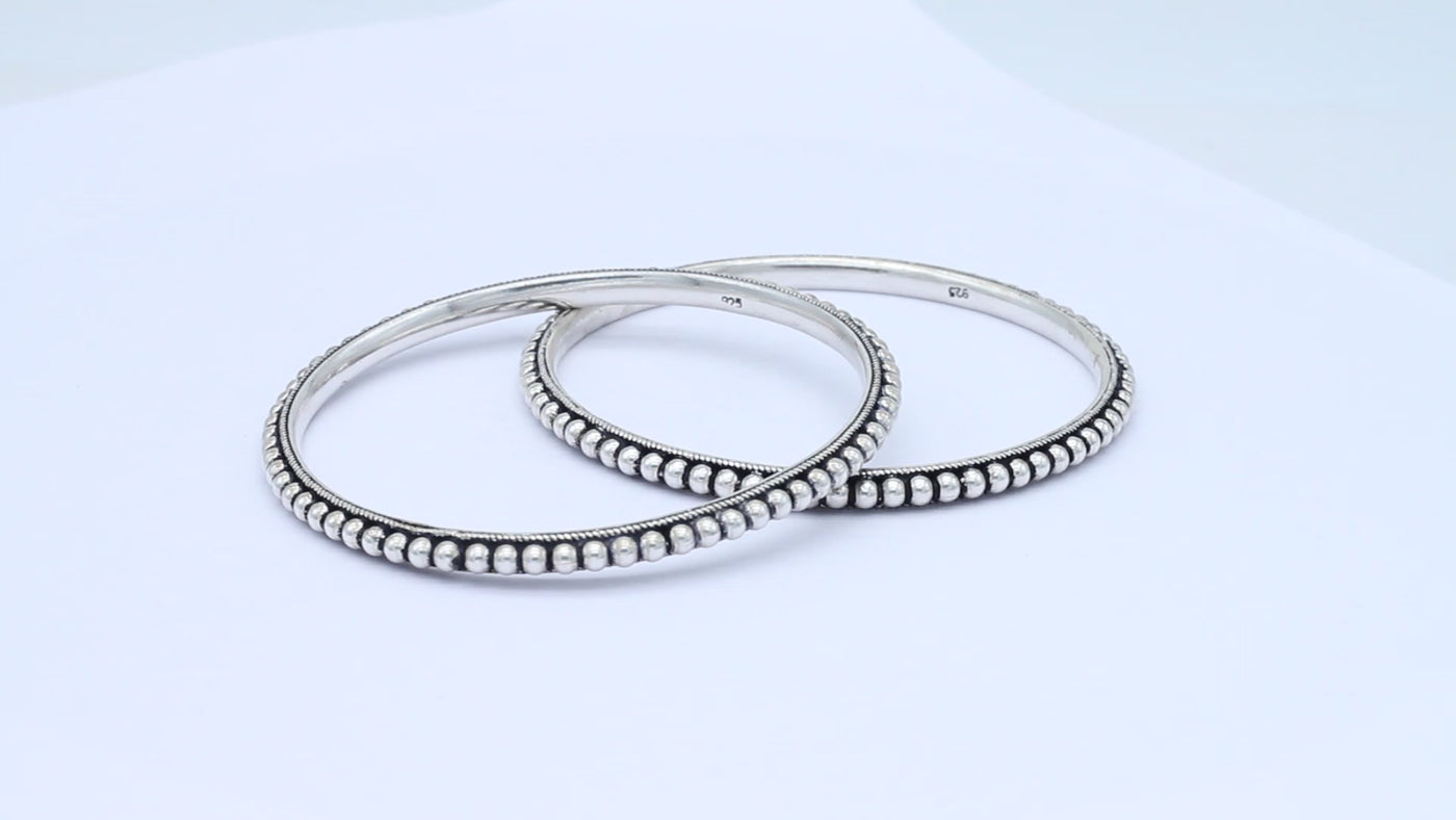 Silver tiny ball affixed silver bangle pair for girls